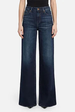 7 For All Mankind: женские модели 2026–2027 — прямые, расклешённые и мягкие силуэты: Dojo и Tailorless Dojo в Slim Illusion, реальный каталожный ракурс 1