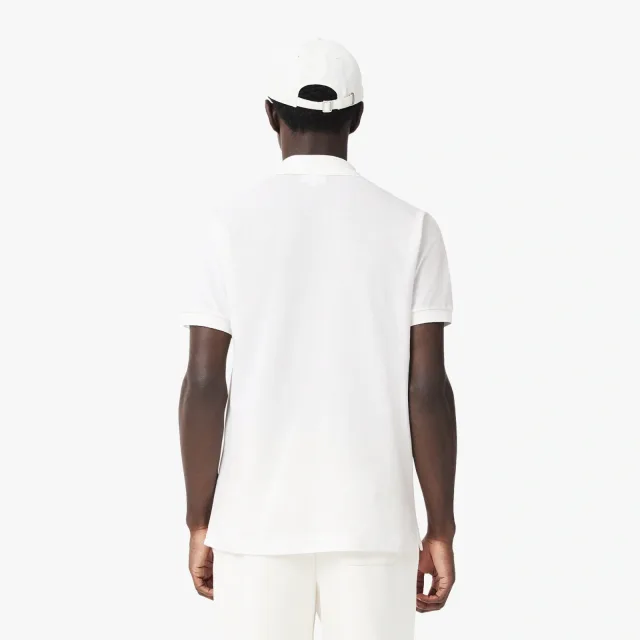 Lacoste: тренды 2027 для городского гардероба — 5 спокойных ориентиров: Оригинальное поло L.12.12, classic fit, реальный каталожный ракурс 3