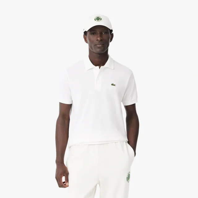 Поло Lacoste в 2027 году: как носить символ бренда вне корта: Оригинальное поло L.12.12, classic fit, реальный каталожный ракурс 1