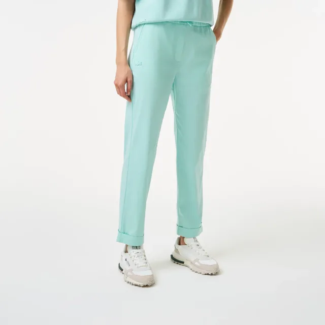 Женские брюки Lacoste: как выбрать посадку для движения весь день: Женские брюки Lacoste с регулируемым поясом, реальный каталожный ракурс 3